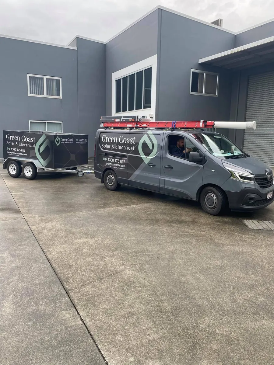 Green Coast van and trailer at the office